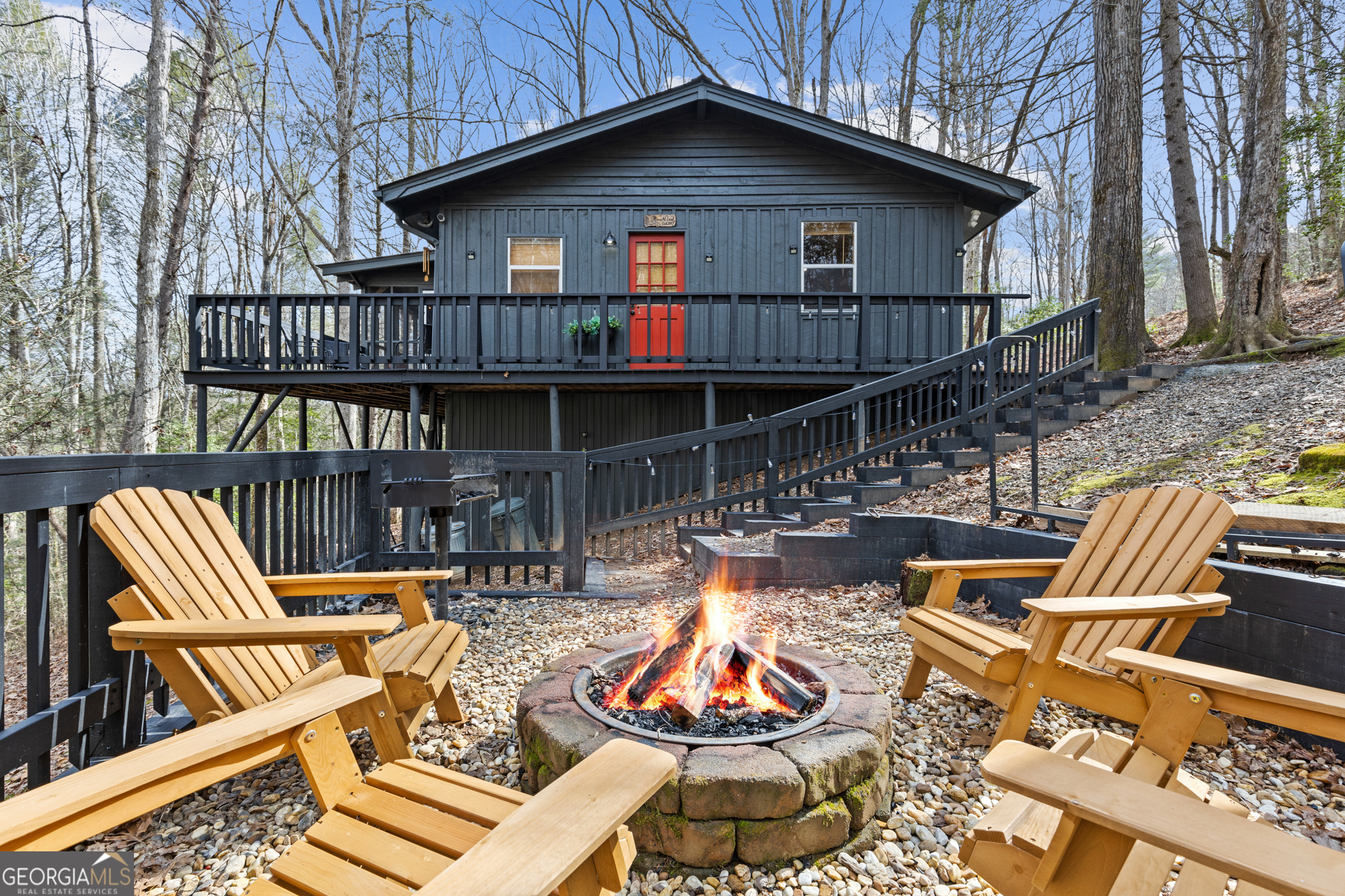 222 Icy Lane Blue Ridge, GA 30513 - Photo 7 of 37 a view of backyard of house with deck and seating space