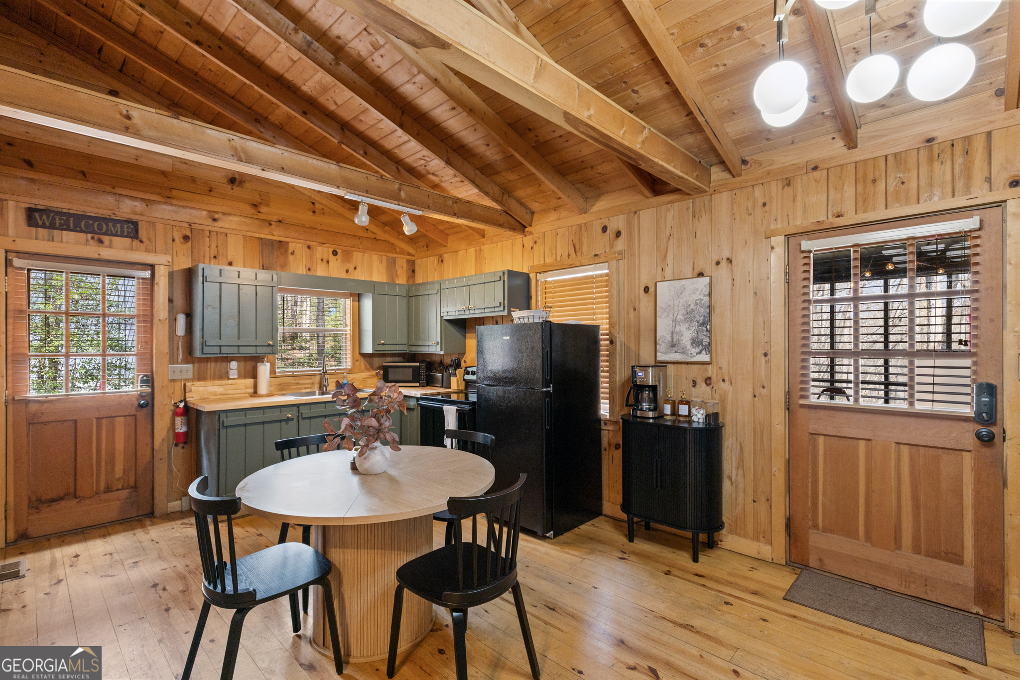 222 Icy Lane Blue Ridge, GA 30513 - Photo 10 of 37 a table and chairs in a room