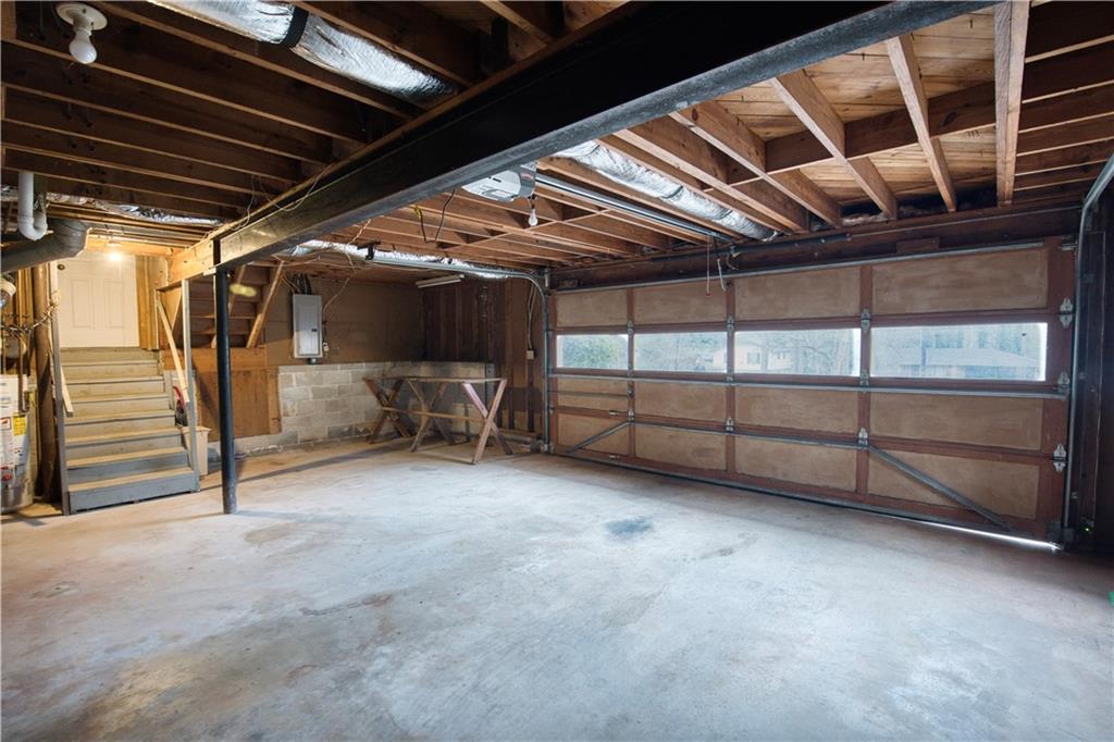 6100 Mincey Road Stone Mountain, GA 30087 - Photo 18 of 40 a view of an empty room with white walls