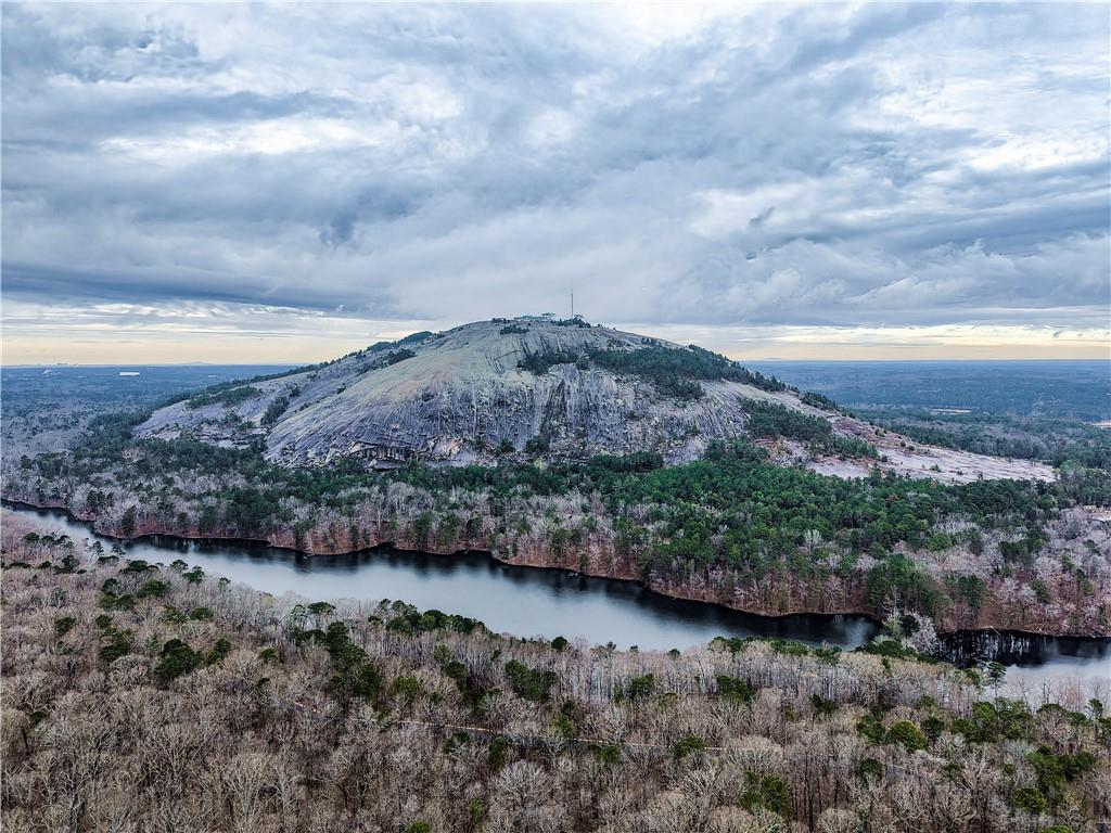 6100 Mincey Road Stone Mountain, GA 30087 - Photo 28 of 40 a view of a lake with mountains in the background