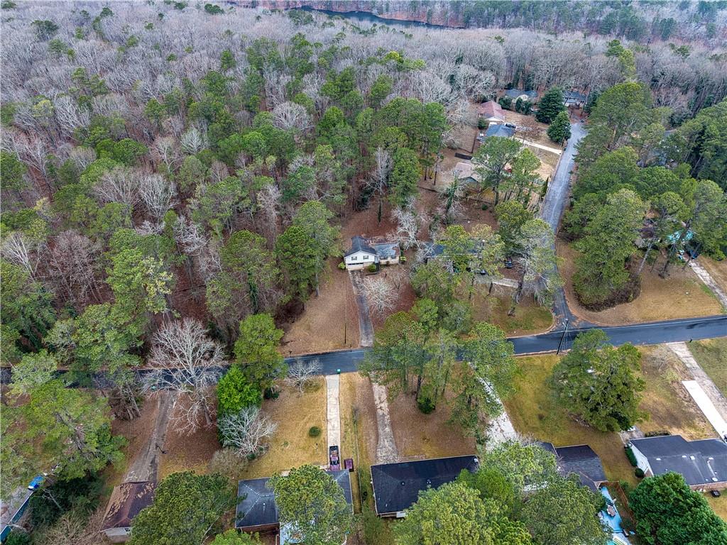 6100 Mincey Road Stone Mountain, GA 30087 - Photo 30 of 40 an aerial view of a house with outdoor space