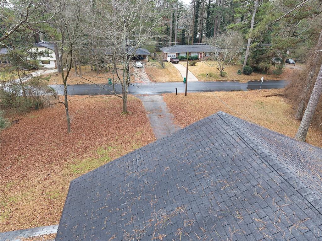 6100 Mincey Road Stone Mountain, GA 30087 - Photo 31 of 40 a view of a yard and basketball court