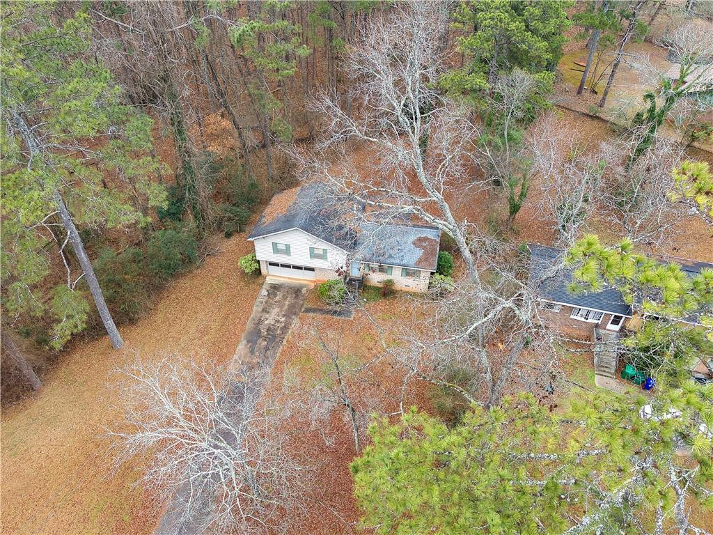 6100 Mincey Road Stone Mountain, GA 30087 - Photo 37 of 40 a backyard of a house with a yard and outdoor seating