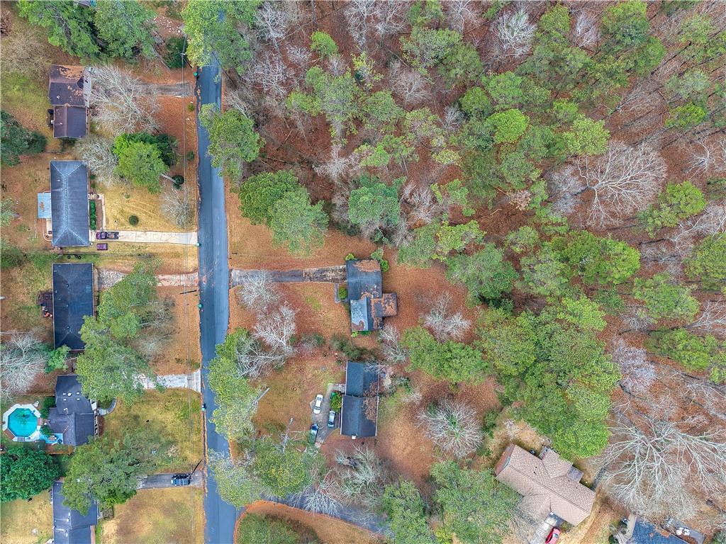 6100 Mincey Road Stone Mountain, GA 30087 - Photo 39 of 40 an aerial view of residential houses with outdoor space