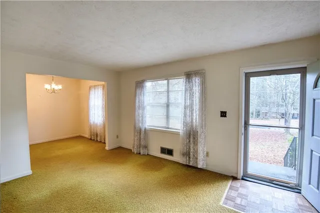 an empty room with windows