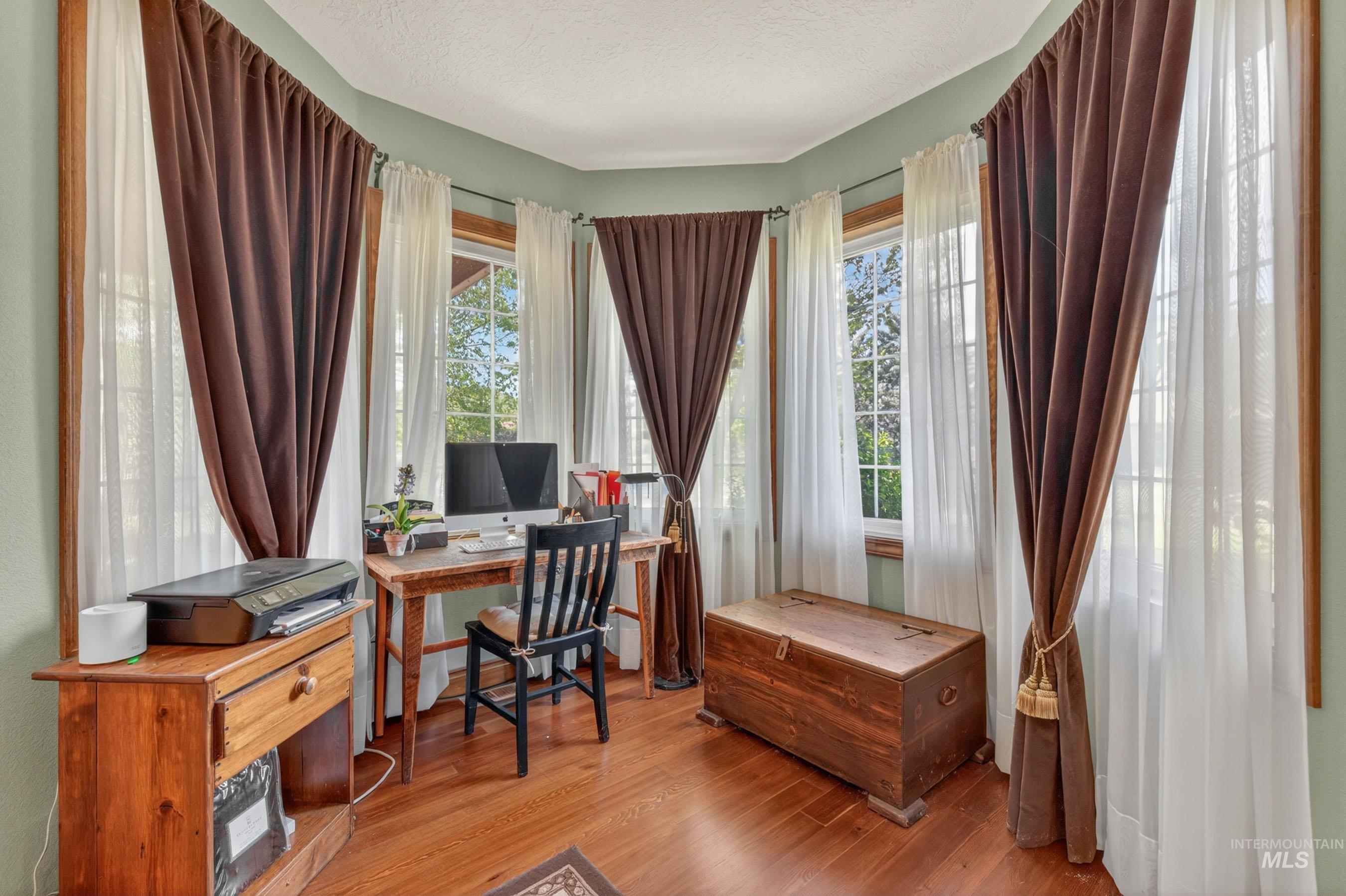 113 Deford Road White Bird, ID 83554 - Photo 19 of 49 Bay window alcove featuring wood-finish flooring