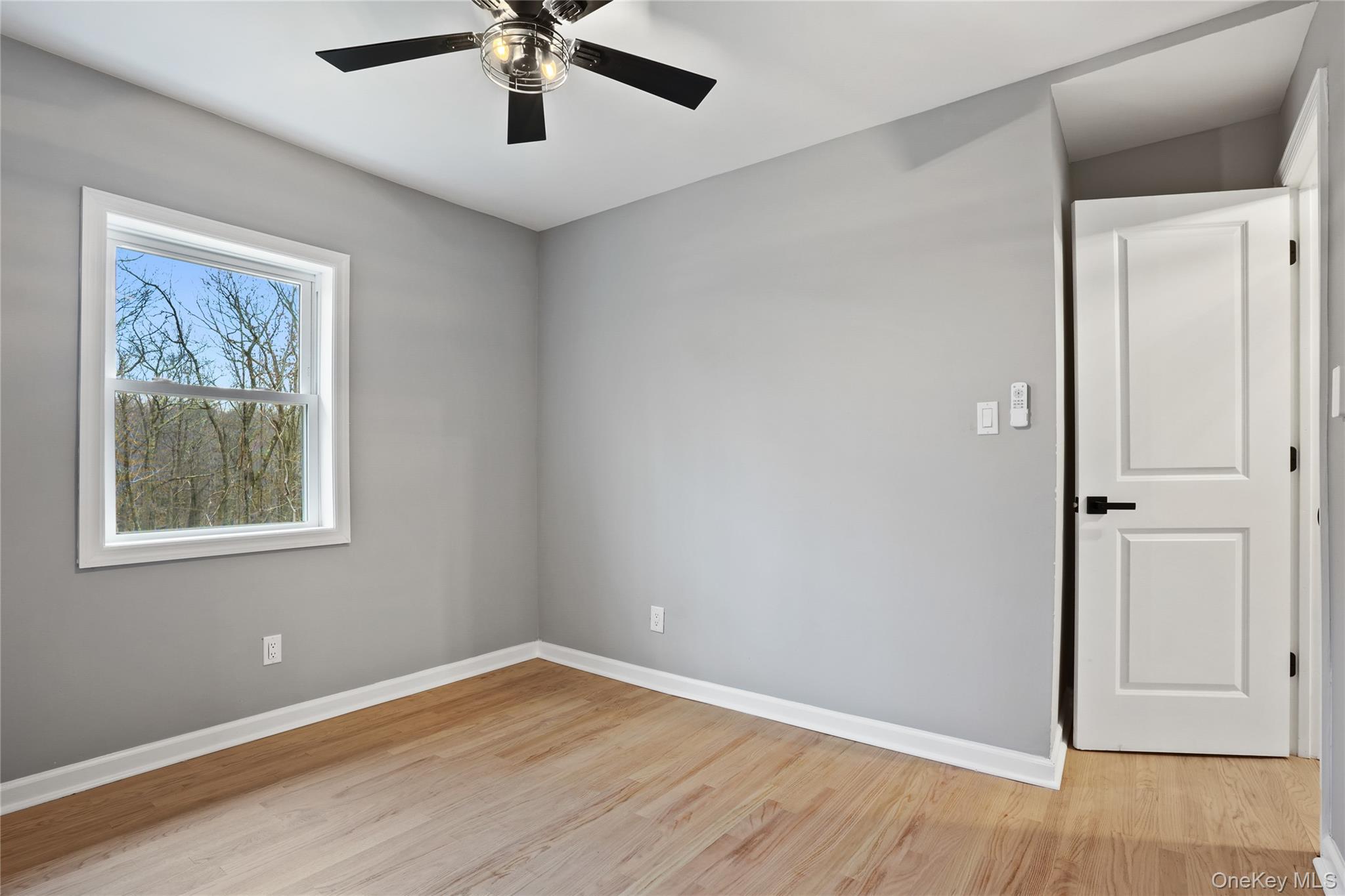 517 East Mountain Road North, Unit 515517 Cold Spring, NY 10516 - Photo 23 of 30 a view of an empty room with wooden floor and a window