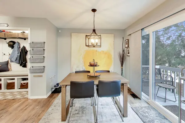 a view of a dining room with furniture window and outside view