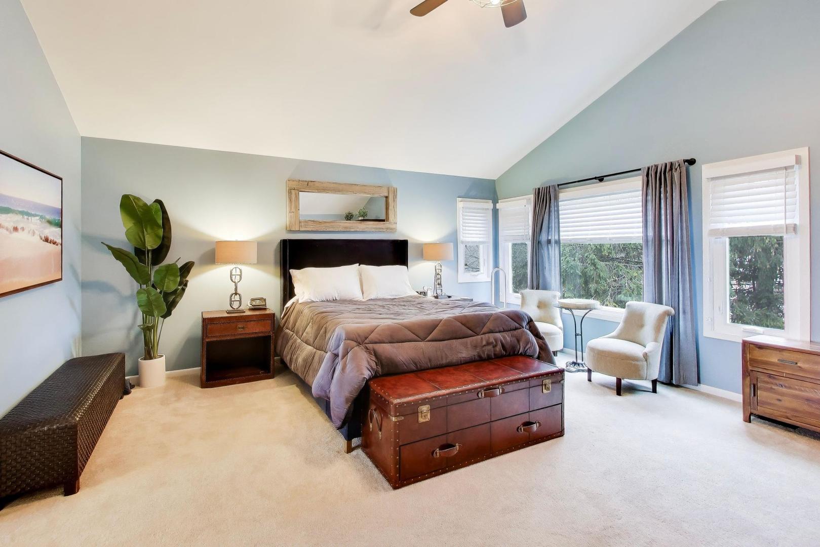 22 Rodeo Drive Burr Ridge, IL 60527 - Photo 17 of 46 a bedroom with a bed and large window