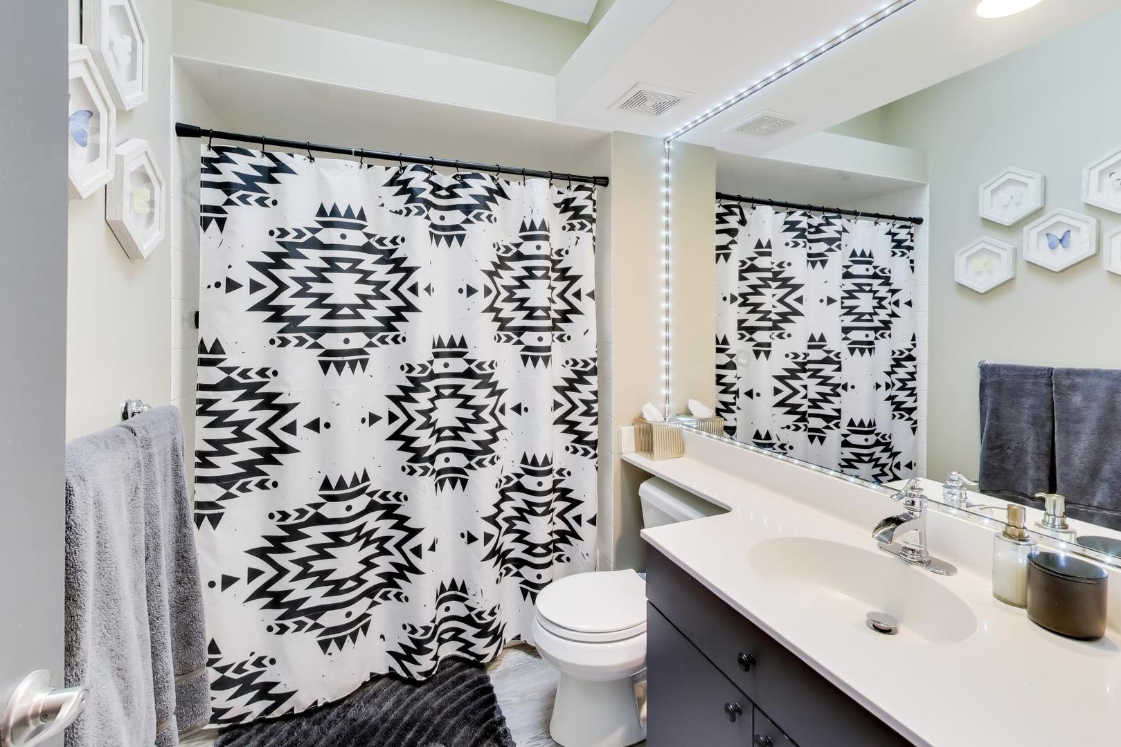 22 Rodeo Drive Burr Ridge, IL 60527 - Photo 25 of 46 a bathroom with a sink toilet and shower