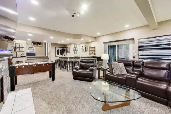 a living room with furniture and a table