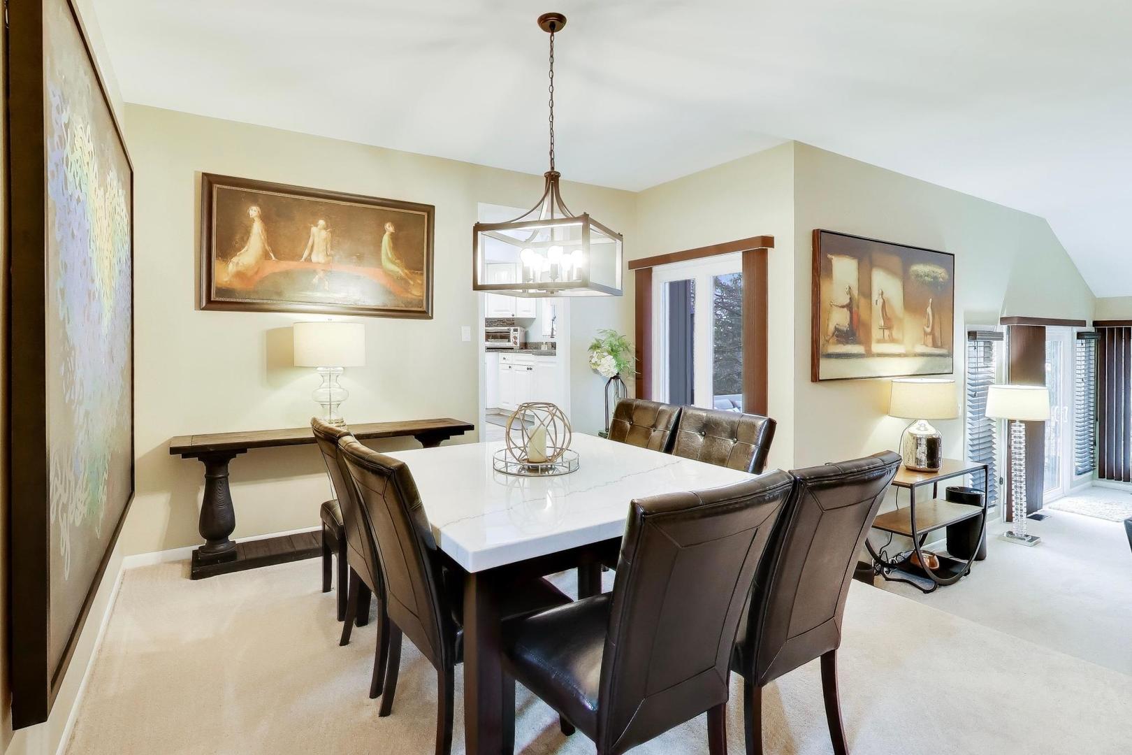 22 Rodeo Drive Burr Ridge, IL 60527 - Photo 6 of 46 a view of a dining room with furniture window and wooden floor