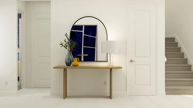 a kitchen with a table chairs and a wooden floor