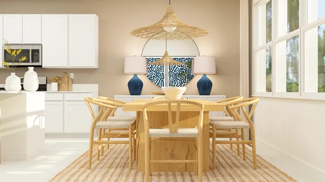 a dining room with a table and chairs