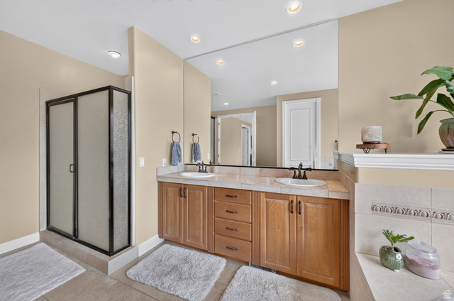 767 Draper View Road Draper, UT 84020 - Photo 27 of 71 Dual vanity with wood-finish cabinetry and light-toned countertops
