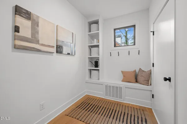 a bedroom with a bed and the wall painting