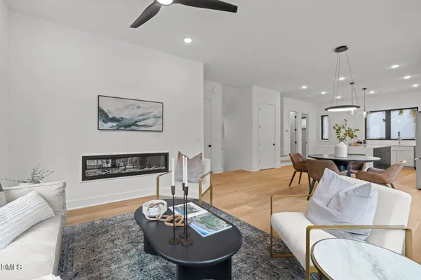 a living room with furniture and a table