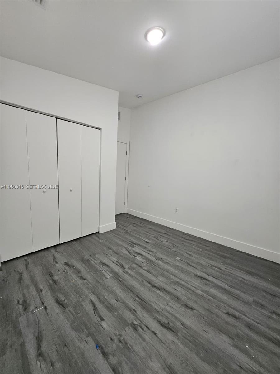 224 Northwest 57th Street, Unit B Miami, FL 33127 - Photo 34 of 40 a view of an empty room