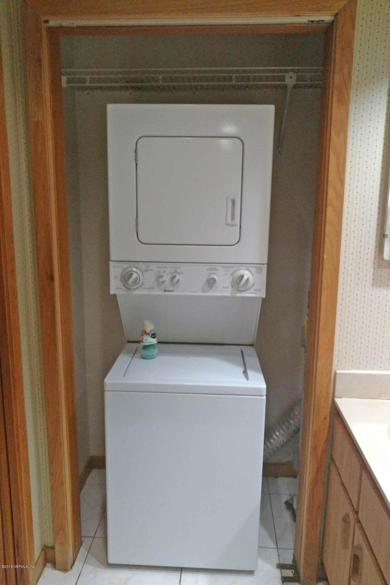 3175 Ravines Road, Unit 3705 Middleburg, FL 32068 - Photo 9 of 13 a utility room with dryer and washer