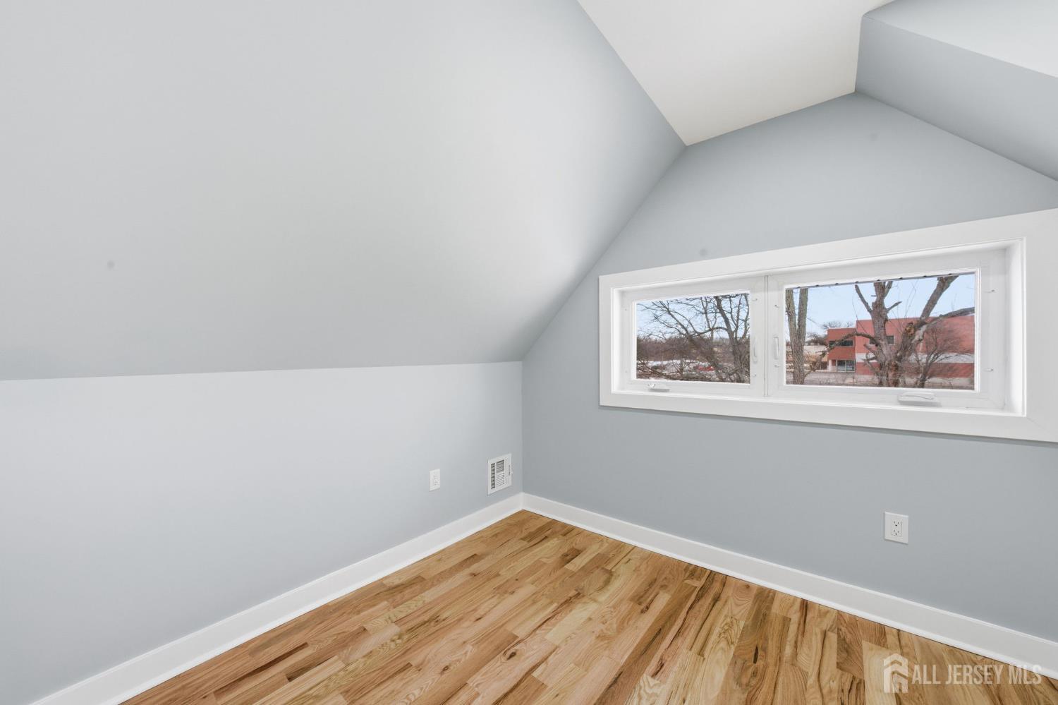 115 Frank Street Somerset, NJ 08873 - Photo 18 of 30 a view of a small space with wooden floor and a window
