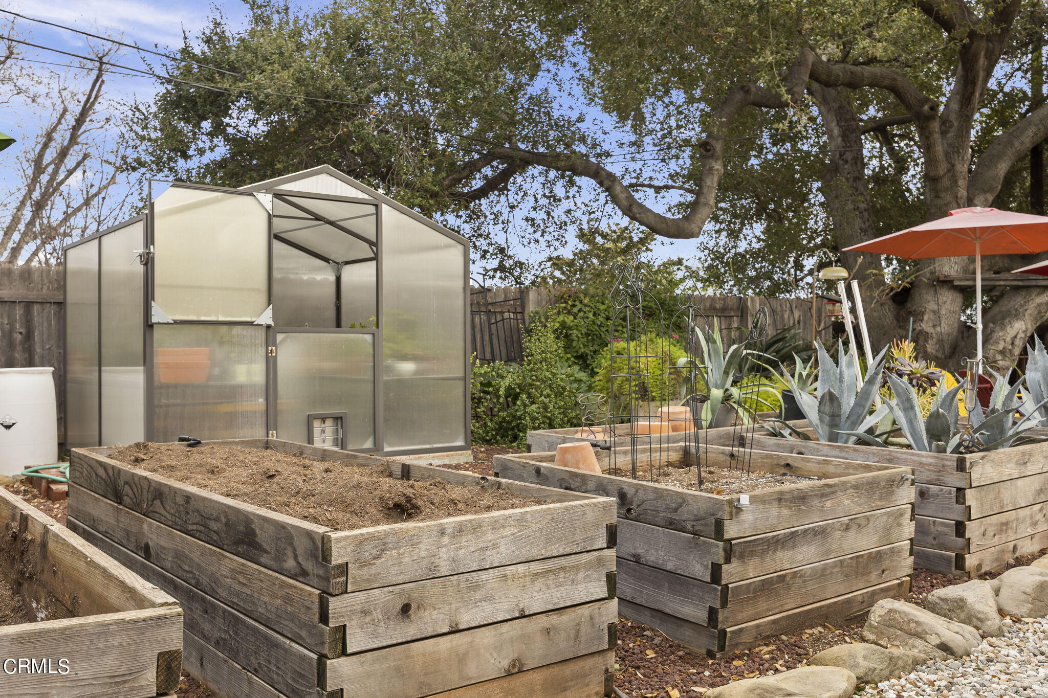 1402 Meadowbrook Road Ojai, CA 93023 - Photo 27 of 31 an aerial view of a house with table and chairs