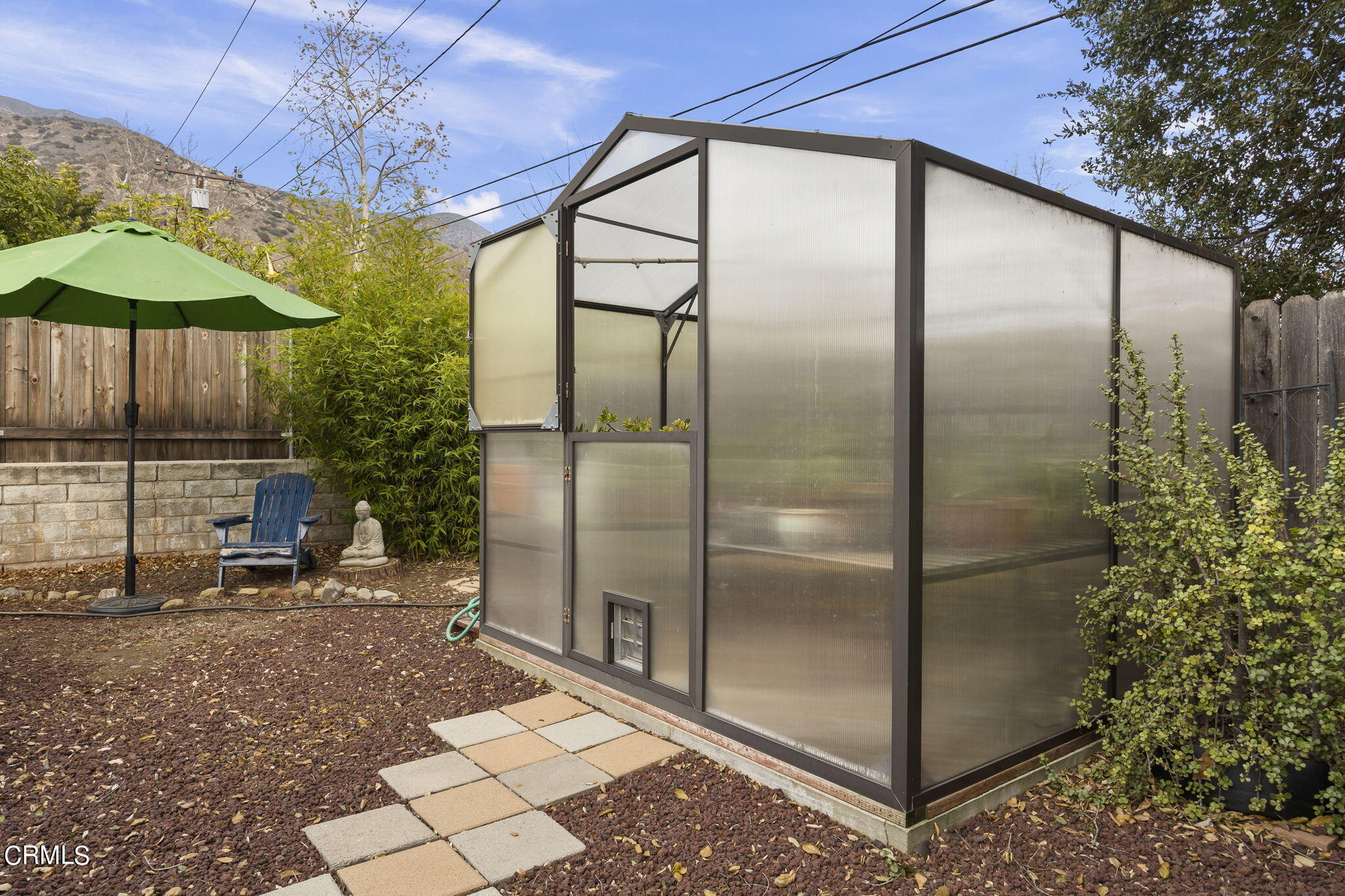 1402 Meadowbrook Road Ojai, CA 93023 - Photo 28 of 31 a bathroom with a glass shower door and a sink