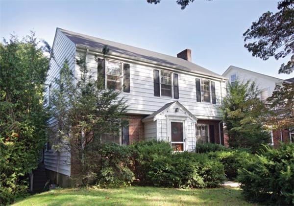 307 Russett Road Brookline, MA 02467 - Photo 1 of 5 a front view of a house with a yard