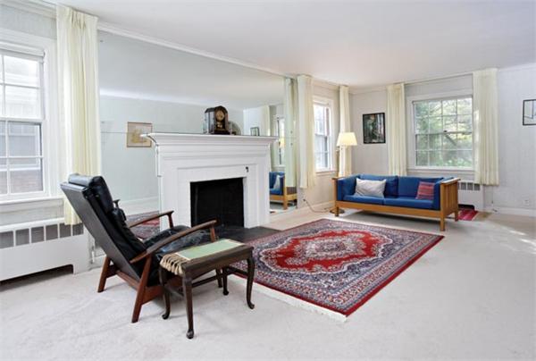 307 Russett Road Brookline, MA 02467 - Photo 2 of 5 a living room with furniture and a fireplace
