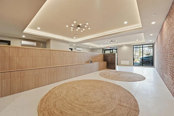 a view of a livingroom with a white furniture
