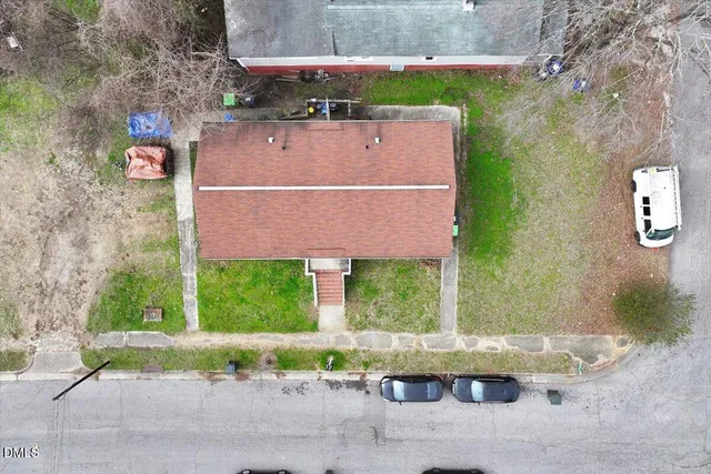 front view of a house with a small yard
