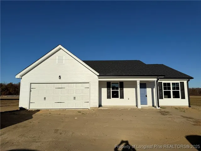 a view of a house with a garage