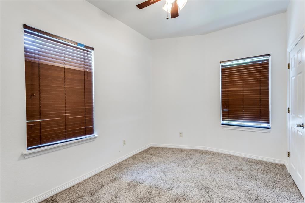 618 East Woodard Street Denison, TX 75021 - Photo 13 of 22 a view of an empty room with a window