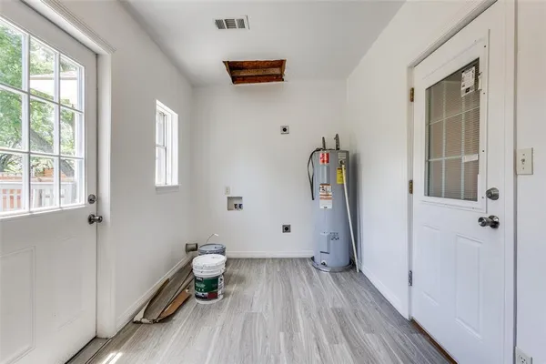 a view of entryway with wooden floor