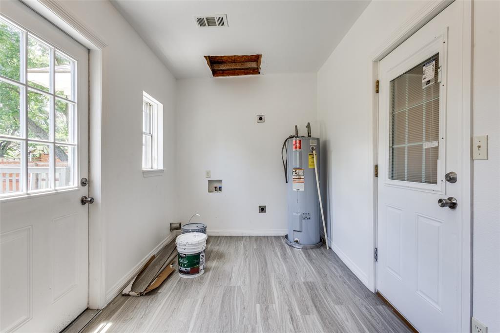 618 East Woodard Street Denison, TX 75021 - Photo 18 of 22 a view of entryway with wooden floor