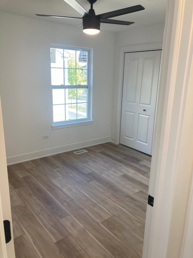 935 Saddle Ridge Drive Joliet, IL 60432 - Photo 11 of 21 a view of an empty room with a window