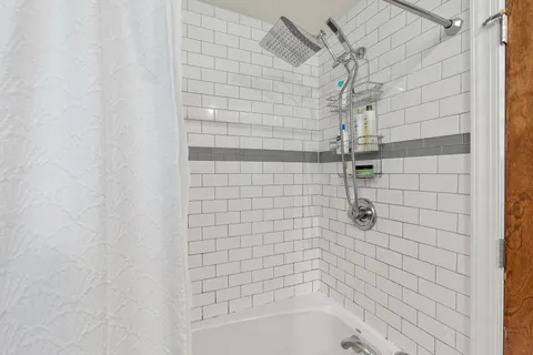 a bathroom with a bathtub