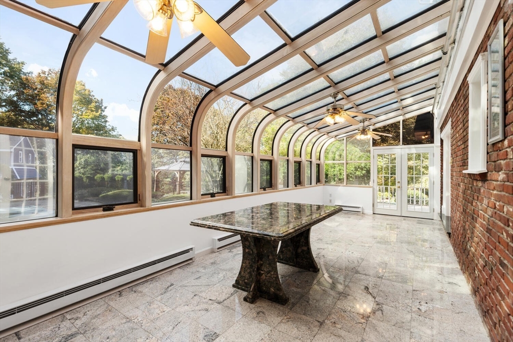 227 Walnut Street Saugus, MA 01906 - Photo 15 of 41 a view of a porch with furniture and a window