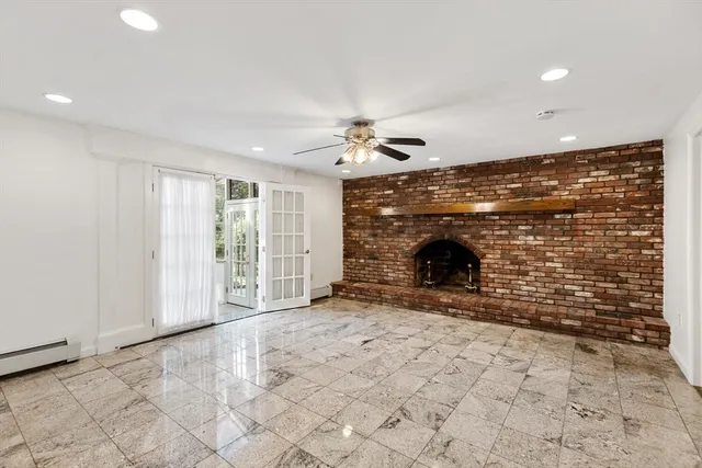 a view of livingroom with a fireplace