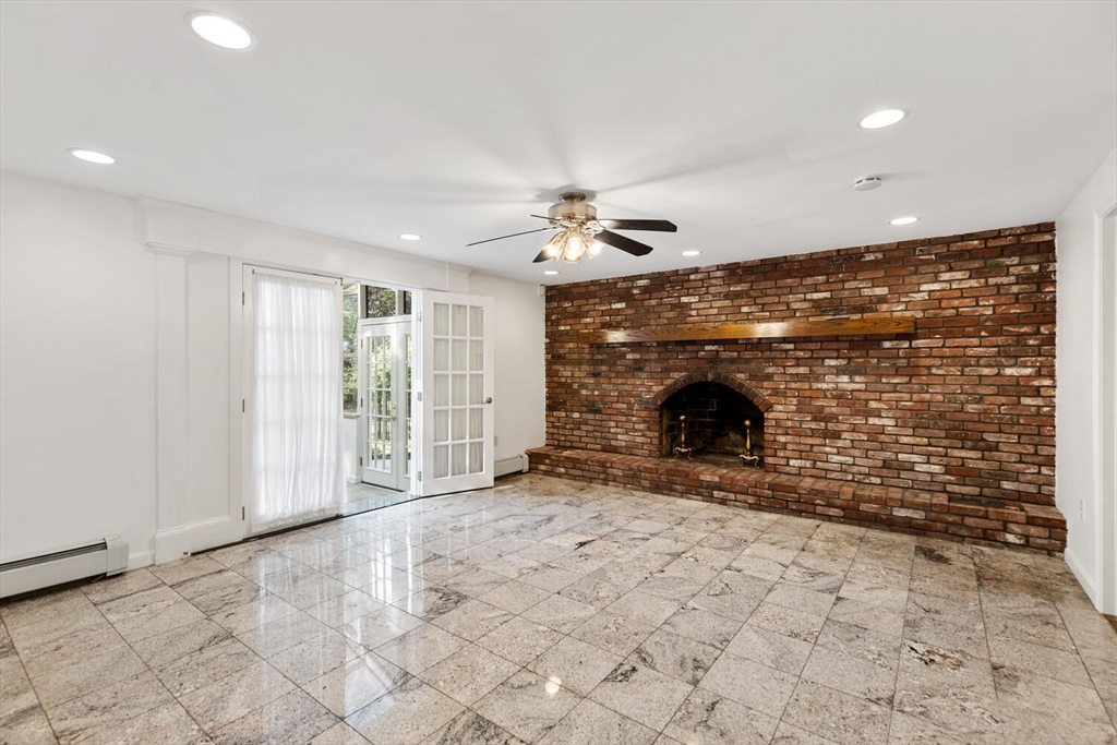 227 Walnut Street Saugus, MA 01906 - Photo 16 of 41 a view of livingroom with a fireplace