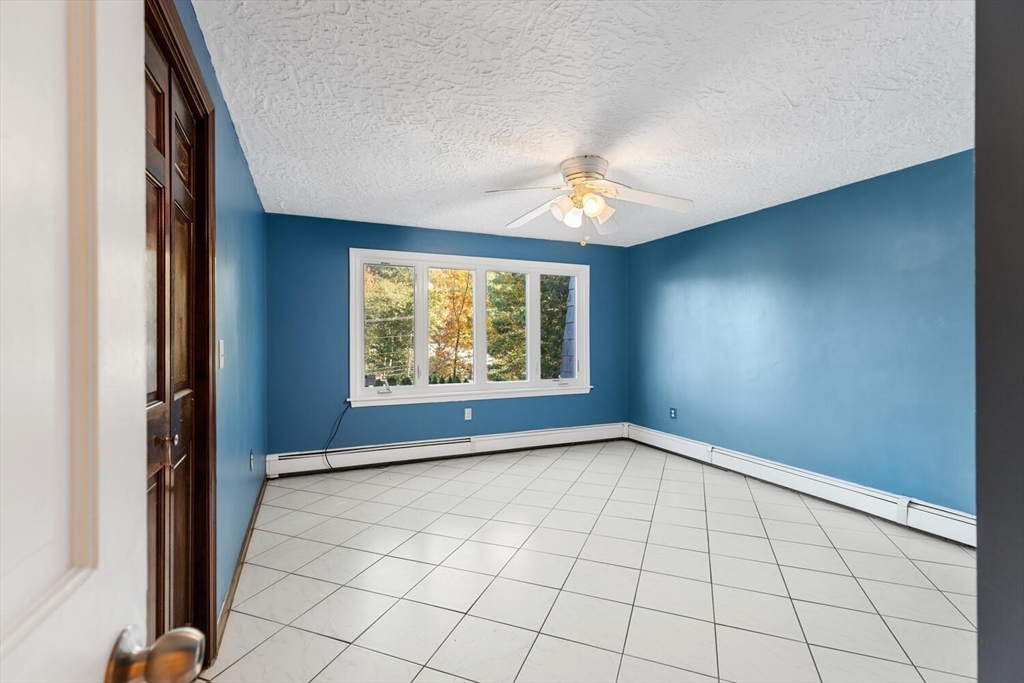 227 Walnut Street Saugus, MA 01906 - Photo 20 of 41 an empty room with windows