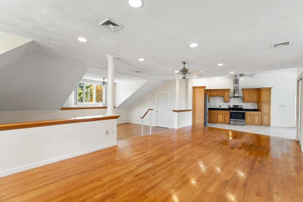 227 Walnut Street Saugus, MA 01906 - Photo 24 of 41 a view of kitchen with cabinets and wooden floor