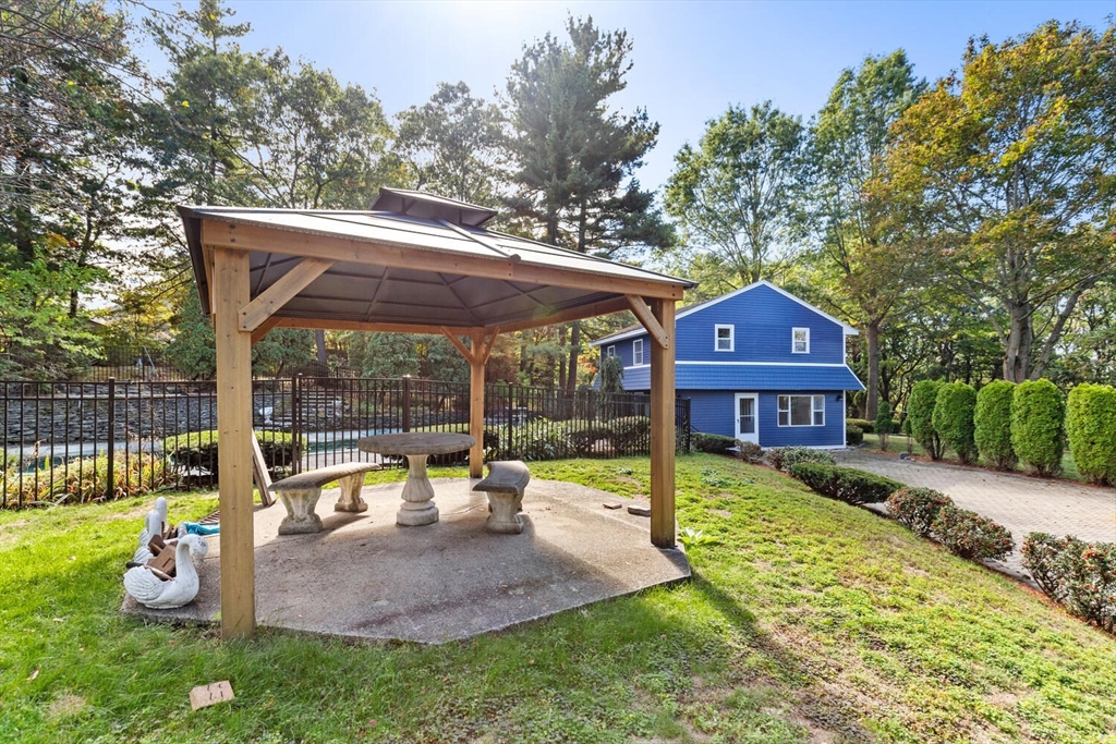 227 Walnut Street Saugus, MA 01906 - Photo 33 of 41 a view of a house with a yard patio and a patio