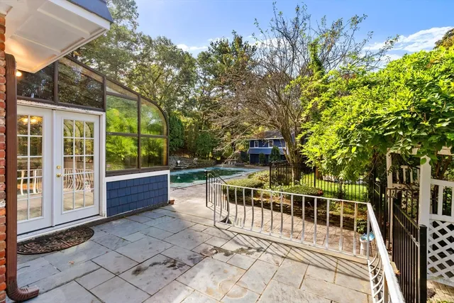 a view of a chairs and tables in the balcony