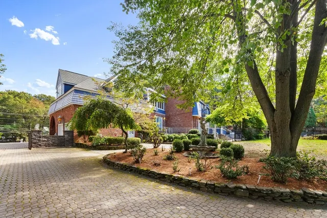 a view of a street with cars on city street