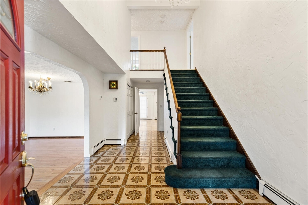 227 Walnut Street Saugus, MA 01906 - Photo 7 of 41 a view of entryway with wooden floor