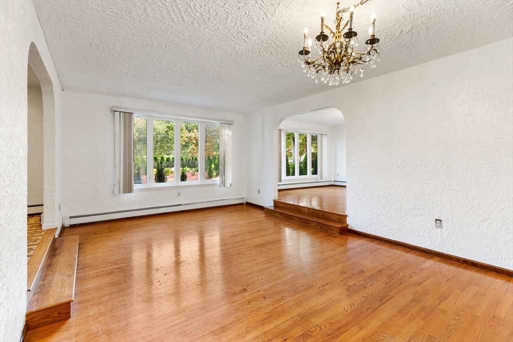 227 Walnut Street Saugus, MA 01906 - Photo 10 of 41 wooden floor in an empty room with a window