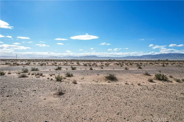 a view of a beach with a yard