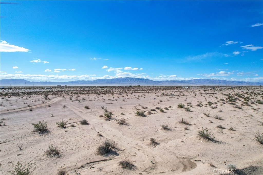 82480 Pipeline Road Twentynine Palms, CA 92277 - Photo 20 of 21 a view of a beach with a yard