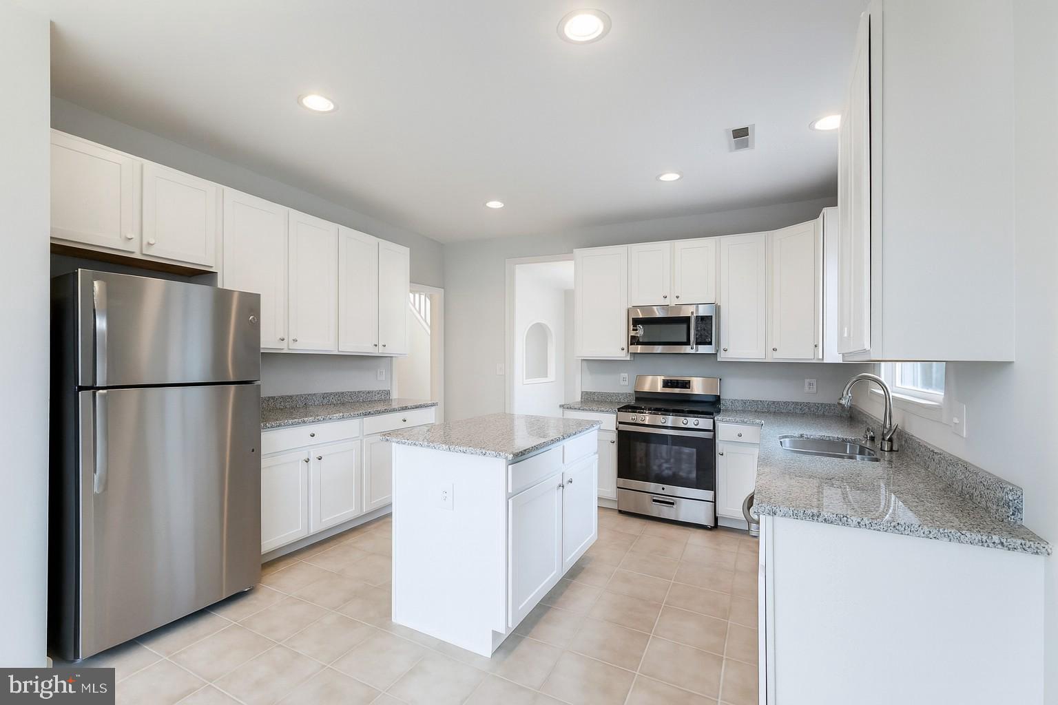 6868 Saddle Run Way Gainesville, VA 20155 - Photo 35 of 59 Virtually Staged Kitchen