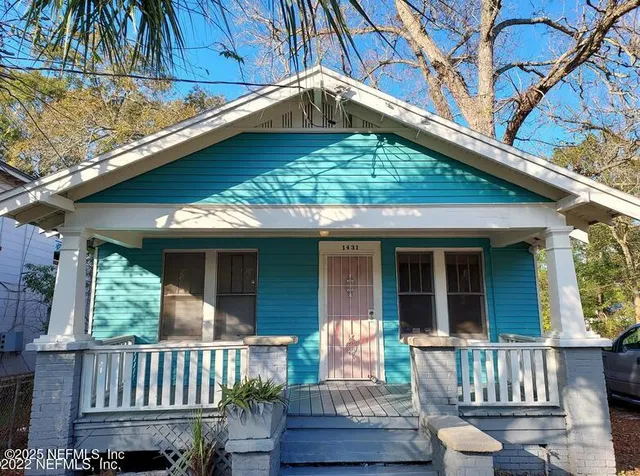 a front view of a house with a porch
